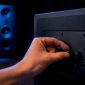 Handmatig de crossoverregelaar van de subwoofer instellen
